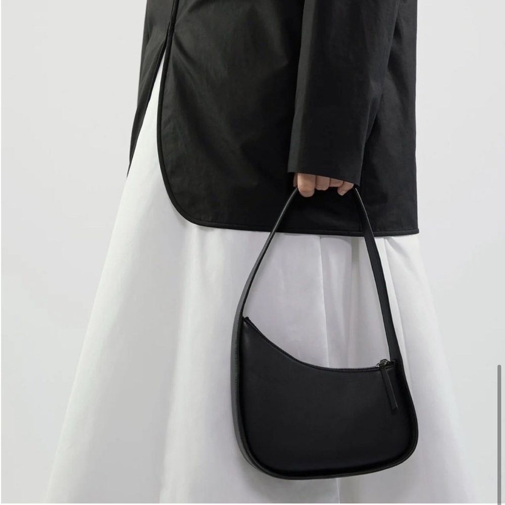 brand new The Row Half moon bag in black leather